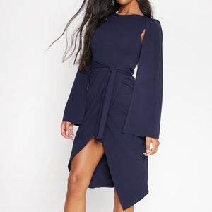 Donated to Women in Distress 
Navy Cape Style Wrap Midi Dress